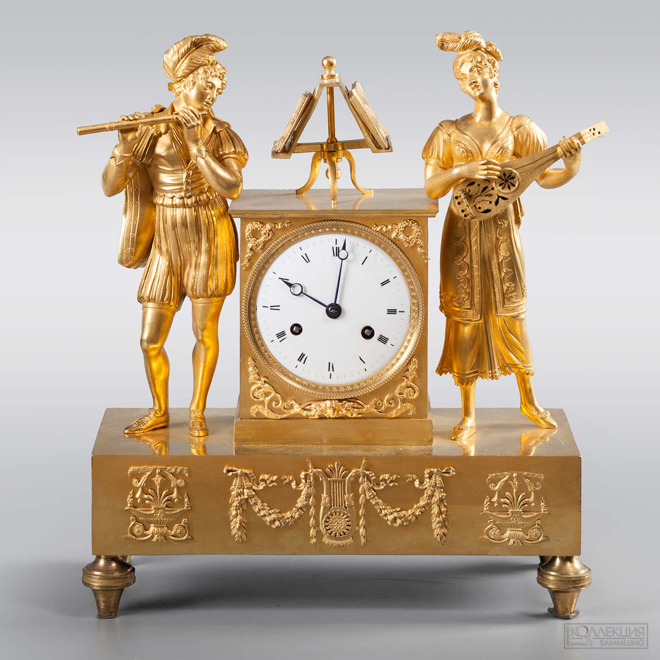 Часы каминные. Трубадуры в стиле ампир. Франция, первая треть XIX века