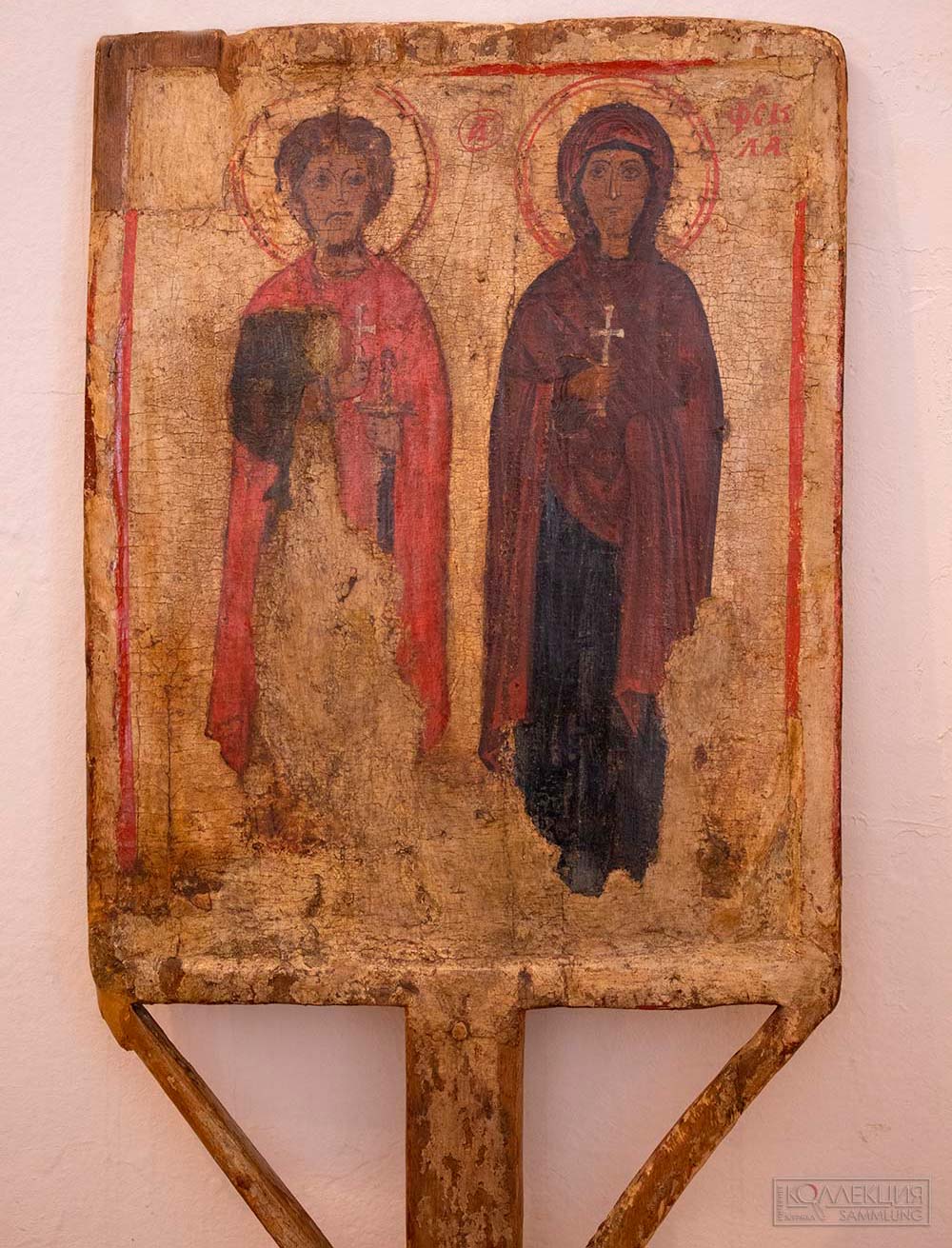 Святые мученики Евстафий Плакида и Фёкла. Двусторонняя икона. Лицевая сторона: конец XIV века. Ростов. Оборотная сторона: вторая половина XIII века. Ростов. Дерево, темпера. Собрание Государственного музея-заповедника «Ростовский кремль»