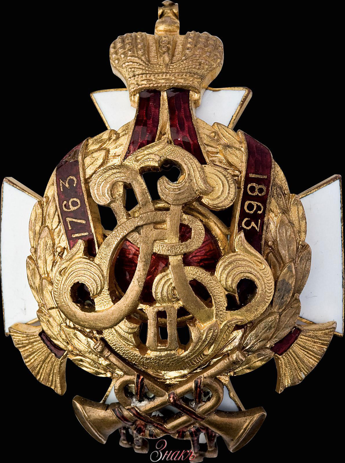 Офицерский знак 70-го пехотного Ряжского полка. Мастерская Э. Кортмана. Клеймо: на закрутке – фирменное «Э. КОРТМАНЪ». Бронза, позолота, эмаль. Размер 50×37 мм. Вес 31,99 г. Этот Знак 70-го пехотного Ряжского полка проходил на «Аукционный дом Знакъ» Аукцион №6 Атлас 6 — 25.05.2019 г.