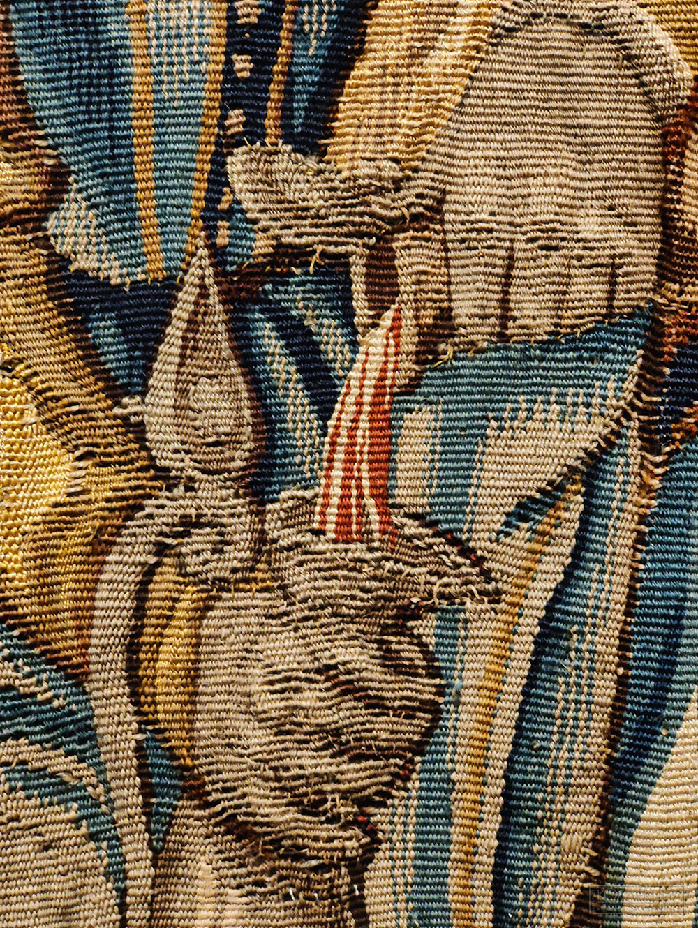 Шпалера "Сад любви". Южные Нидерланды, Брюгге. Конец XVI - начало  XVII века. Шерсть, шёлк; шпалерное ткачество. ГМИИ им. А.С. Пушкина (Фрагмент)