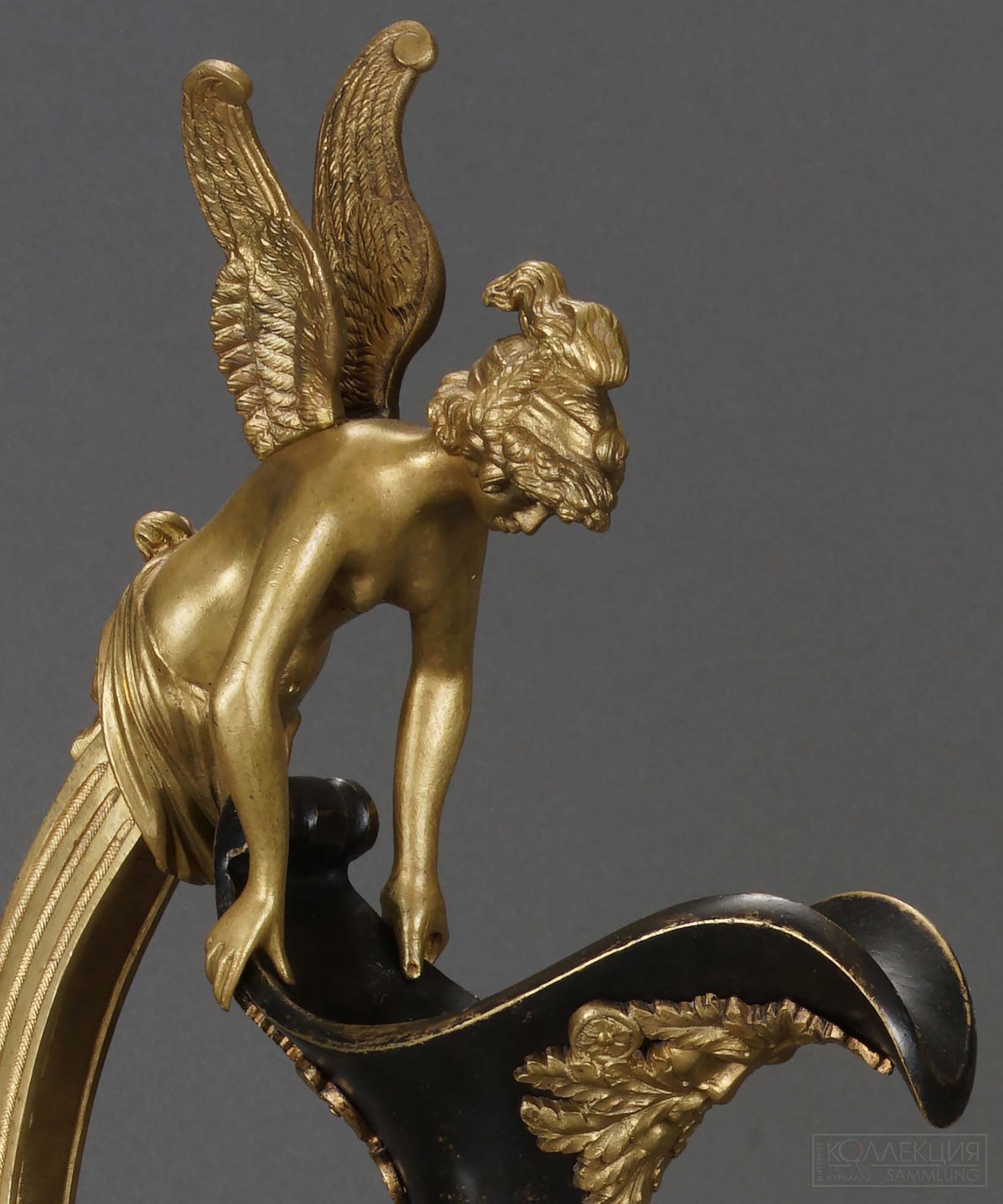 Кувшин (фрагмент). Россия (?). Начало ХІХ века (?). Бронза, литьё, золочение, оксидирование. Высота 62,1 см. Государственный музей-заповедник «Царицыно»